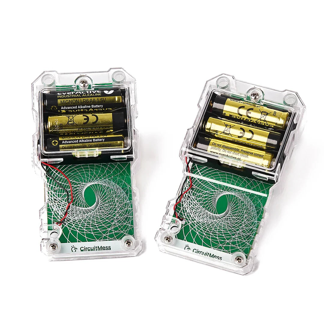 Two green electronic devices with buttons and screens on a white background